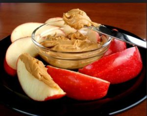 Pre-Workout Snack Apple with Peanuts Butter