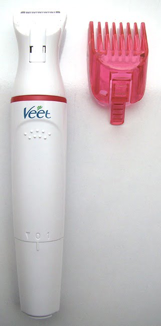 Bigger Head Of Veet Electric Trimmer And Its Comb Attachment