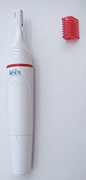 Smaller Head Of Veet Electric Trimmer And its Comb Attachment